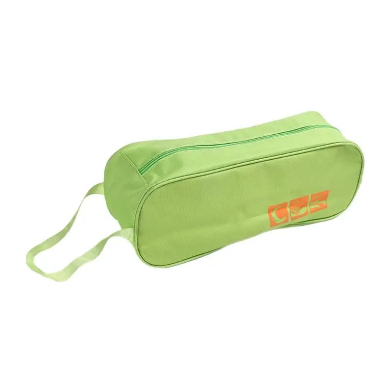 Green shoe bag with a strap on a white background