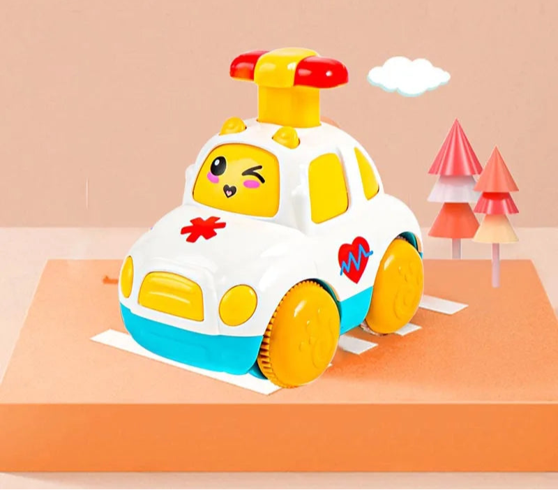white ambulance wind up toy with a wink face windscreen