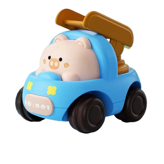 pink piggy driving a blue wind up toy car